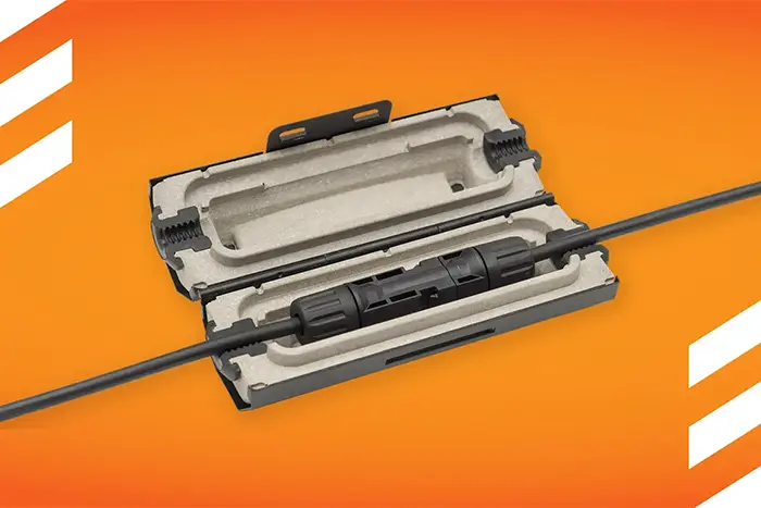 ArcBox open with a DC connector inside on an orange background